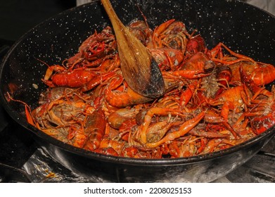 Crayfish Are Cooked In Water In A Saucepan On The Kitchen Stove, Crayfish Are Red From Cooking