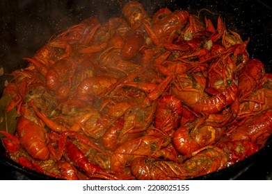 Crayfish Are Cooked In Water In A Saucepan On The Kitchen Stove, Crayfish Are Red From Cooking