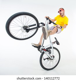 Crazy Boy On A Dirt Jump Bike Isolated On White - Wide Studio Shot