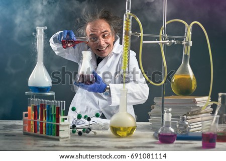 Crazy chemist doing experiment chemical laboratory