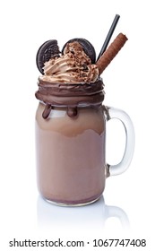 
Crazy Chocolate Milk Shake With Whipped Cream, Cookies And Black Straw In Glass Jar Isolated On White Background