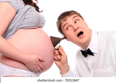 Crazy doctor examining pregnant woman.