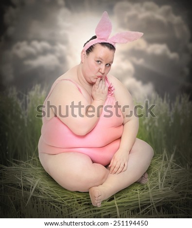 Crazy Easter postcard with overweight woman as a funny Easter Bunny.