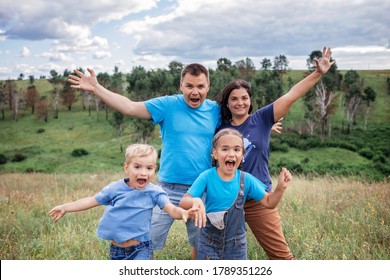 Crazy Family Portrait. Middle Aged Parents With Two Siblings Having Fun And Making Selfie During Local Travel At Summer Vacation, Active Lifestyle Outdoor