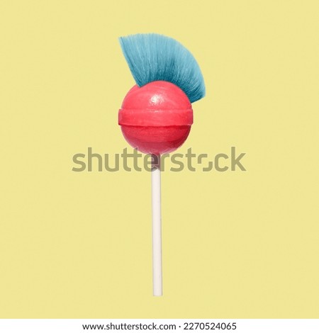Crazy fun candy on a stick with a mohawk hairstyle. Minimal concept of daring and surreal lolly. High quality photo