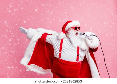 Crazy funky cool grey beard santa claus north-pole pop star celebrity sing song mic enjoy x-mas christmas eve karaoke wear sunglass cap headwear suspenders isolated pastel color background - Powered by Shutterstock