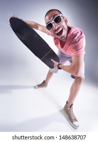 Crazy Guy With A Skateboard Making Funny Faces