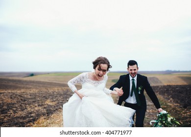 Crazy from happiness couple in the wedding day