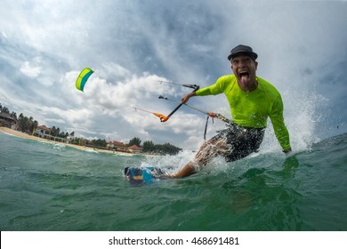 Crazy Kite Surfer Rides The Waves
