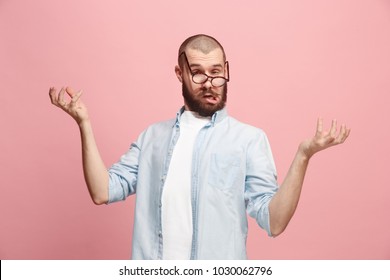 Crazy man. Lost my mind. Stress, shock. Male half-length portrait isolated at pink studio. Young emotional surprised man and surprised. Human emotions, facial expression concept. April fools day - Shutterstock ID 1030062796