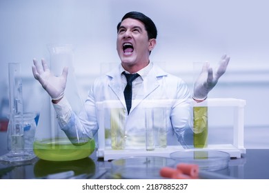 Crazy Scientist In Laboratory. Mad Scientist Inventor Concept. Frustrated Upset Research Man Feeling Tired Worried With Problem In Chemical Laboratory.