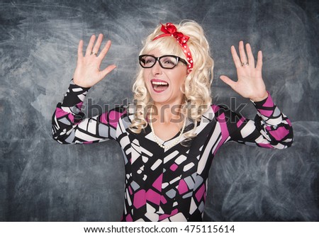 Crazy screaming retro woman on chalkboard blackboard background