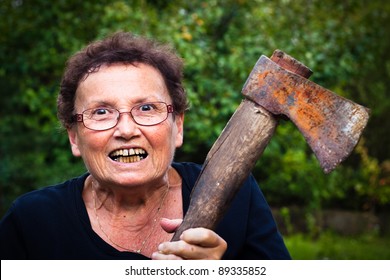 Crazy Senior Woman Holding Axe.