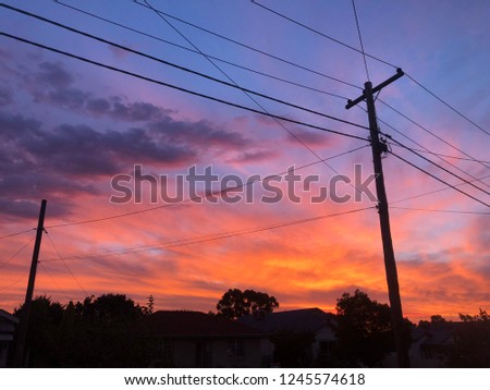 Crazy Sunset captured behind raised powerlines
