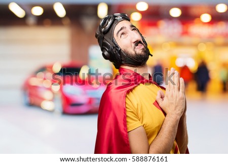 crazy super hero praying