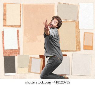 crazy young man jumping. happy expression - Shutterstock ID 418120735