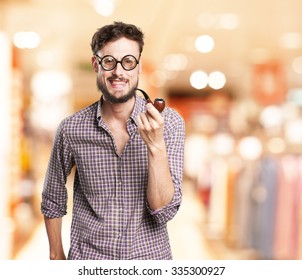 crazy young man with pipe