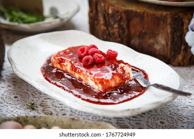 Cream cheese with raspberry jam.