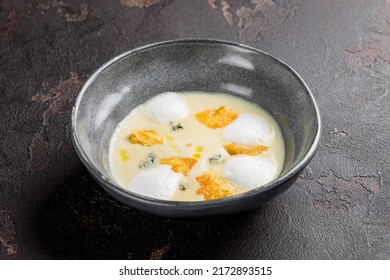 Cream Cheese Soup On Dark Stone Table