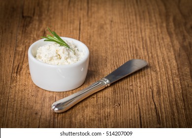 Cream Cheese In White Bowl With Knife 