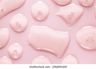 Cream Gel Drops Red Transparent Cosmetic Sample Texture With Bubbles On Pink Background