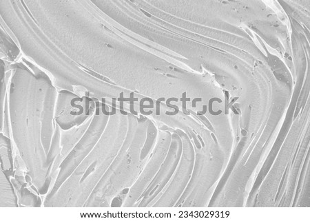 Cream gel gray blue transparent cosmetic sample texture with bubbles isolated on white background
