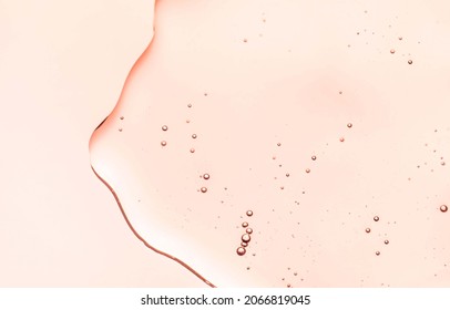 Cream Gel Orange Transparent Cosmetic Sample Texture With Bubbles On Peach Orange Background