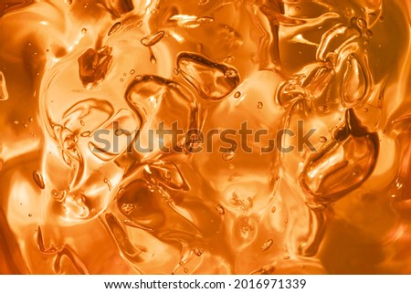 Cream gel orange transparent cosmetic sample texture with bubbles background