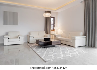 Cream Leather Couch In Exclusive Sitting Room 