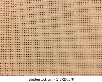 Cream or light beige texture. Eastern pattern of jute Woven vinyl construction material.