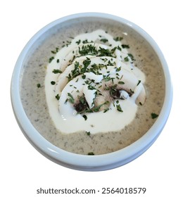 Cream of mushroom soup is a rich, velvety dish made from a blend of sautéed mushrooms, cream, and broth.  - Powered by Shutterstock