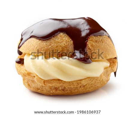 cream puff with custard cream covered with melted chocolate isolated on white background