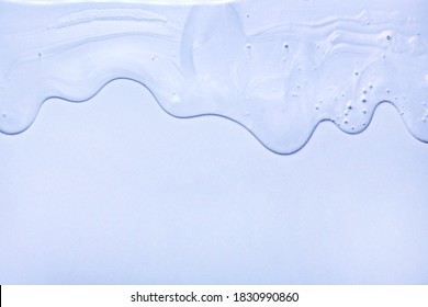 Cream purple blue transparent cosmetic sample texture with bubbles isolated on same colored background
