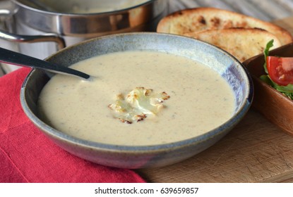 Cream Of Roasted Cauliflower Soup: Served With Grilled Bread And Salad.