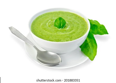 Cream Soup Green From Spinach In A Bowl With Leaf On A Plate Isolated On White Background