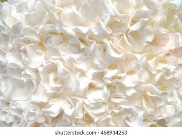Cream Texture on a wedding cake, White texture of whipped cream on a wedding cake. Closed up of cream texture / pattern for background