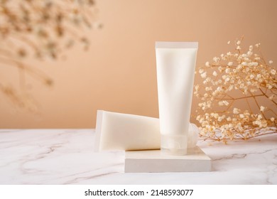 Cream Tube Mockup For Branding Presentation. Natural Skincare Beauty Product On Square White Podium. Natural Earthy Colors, Beige Background