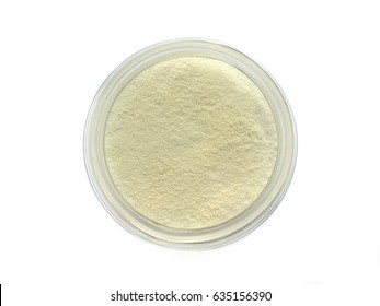 Creamer, Coffee Whitener, Non-dairy Creamer In A Glass Bottle Top View On White Background