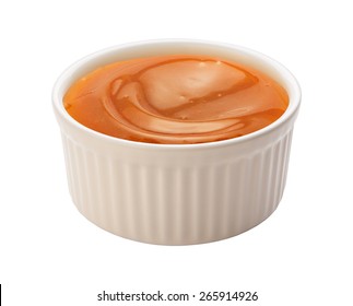 Creamy Caramel Syrup In A White Ramekin. This Sauce Can Be Used For Dipping, Or As An Ingredient. The Image Is A Cut Out, Isolated On A White Background, With A Clipping Path.