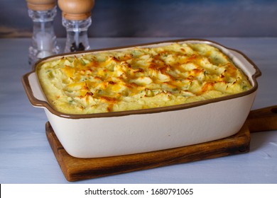 Creamy fish pie: salmon, cod, smoked coley, creamy sauce and cheesy potato topping - Powered by Shutterstock