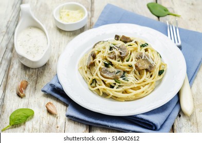 Creamy Mushroom Spinach Pasta. Toning. Selective Focus