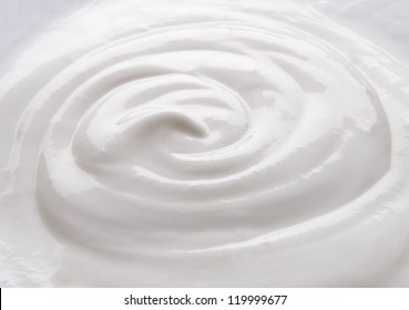 Creamy Natural Yogurt Background. Closeup View.