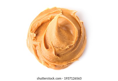 Creamy peanut butter isolated on white background. Top view.
