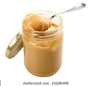 Creamy Peanut Butter In Jar, Isolated On White