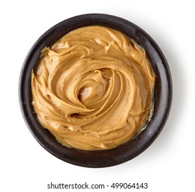 Creamy Peanut Butter In Round Dish Isolated On White Background, Top View