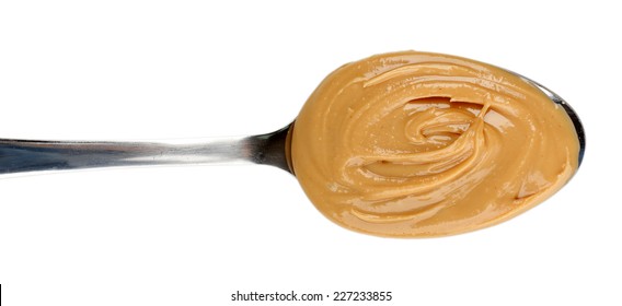 Creamy Peanut Butter In Spoon, Isolated On White