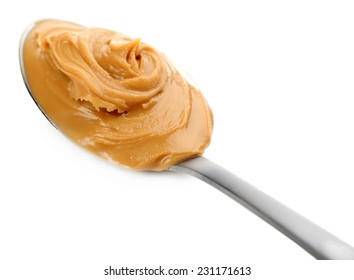 Creamy Peanut Butter In Spoon, Isolated On White