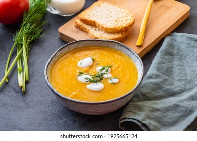 Creamy pumpkin soup with vegetables and spices.