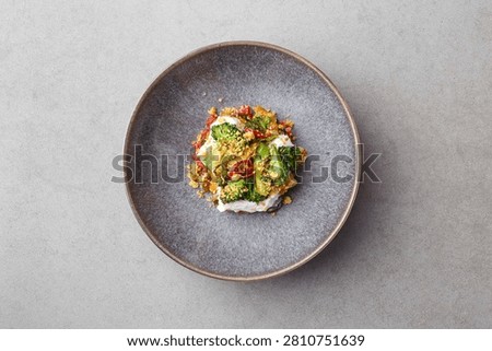 Creamy Risotto Topped With Spring Vegetables And Herbs, Edible Flower Accents And Subtle Parmesan Aroma, Finedining Portion With Comforting Texture