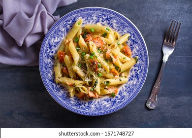 Creamy Salmon Penne Pasta With Green Peas. View From Above, Top